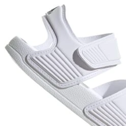 ADIDAS PERFORMANCE Adidas Badeschuhe Adilette Sandale (Klettverschluss) Weiss Kinder - 1 Paar -Head || Wilson || YONEX Verkäufe adidas GW0342 Sandale Kinder208 1200x1200 1